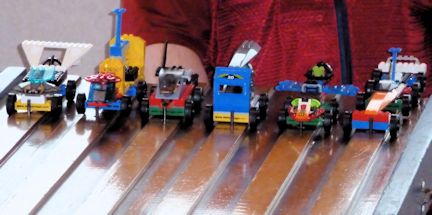 derby cars made from LEGO® bricks on track