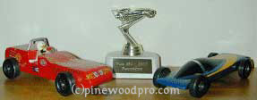 first pinewood derby trophy and derby cars picture