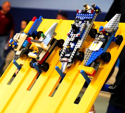 derby cars made from LEGO bricks on pinewood derby track