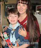 Cub scout with Mom and his pinewood derby car Cub scout with Mom and his pinewood derby car