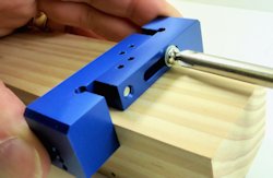 tightening Pinewood Derby drill guide
