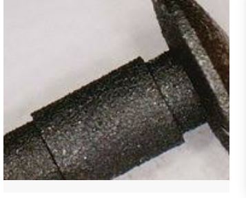 rough graphite coating on pinewood derby axle